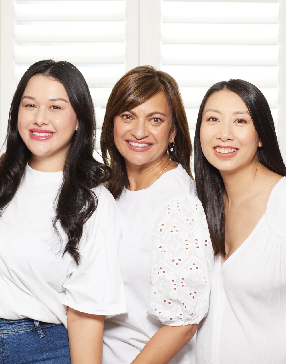 Three ladies smiling